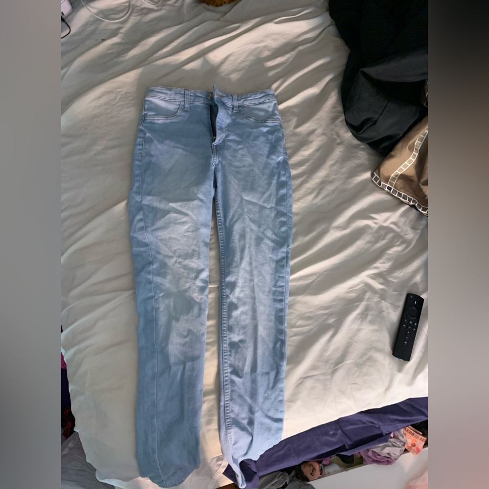 skinny blue jeans. light washed color